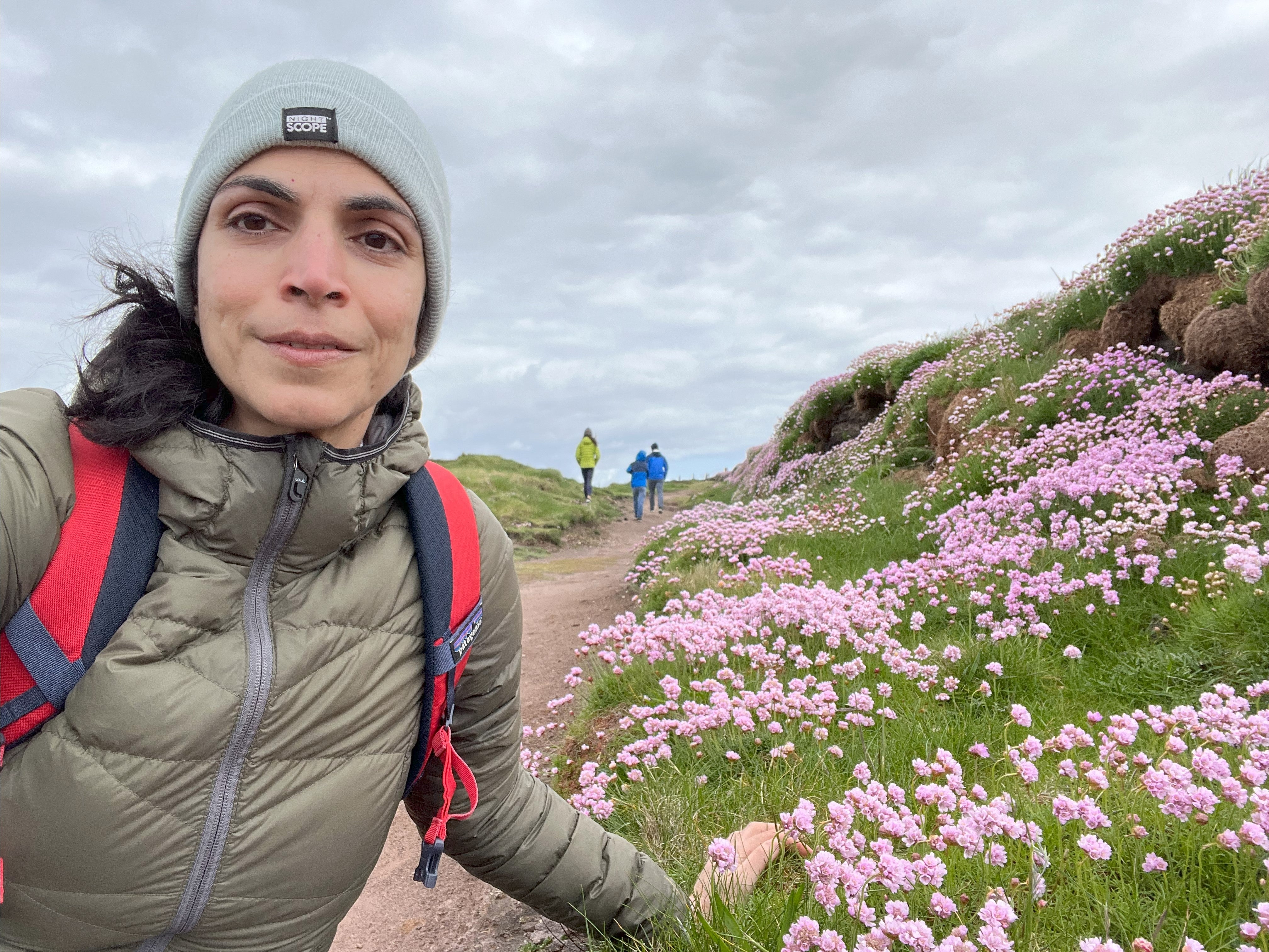 Dr. Tehnaz Boyle taking a selfie along the coast of Ireland.